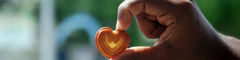 heartshape biscuit in hand