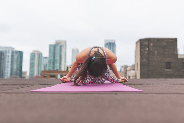 girl doing yoga in morning time