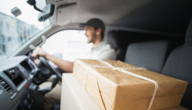 guy delivering package in van