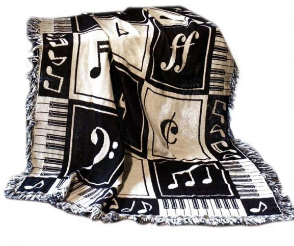 Cozy up with a cute musical throw
