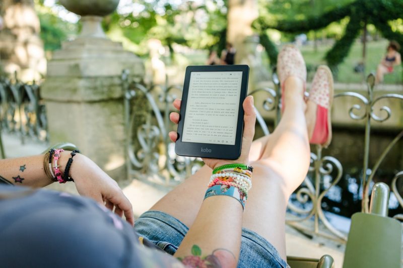 girl reading ebook on tab